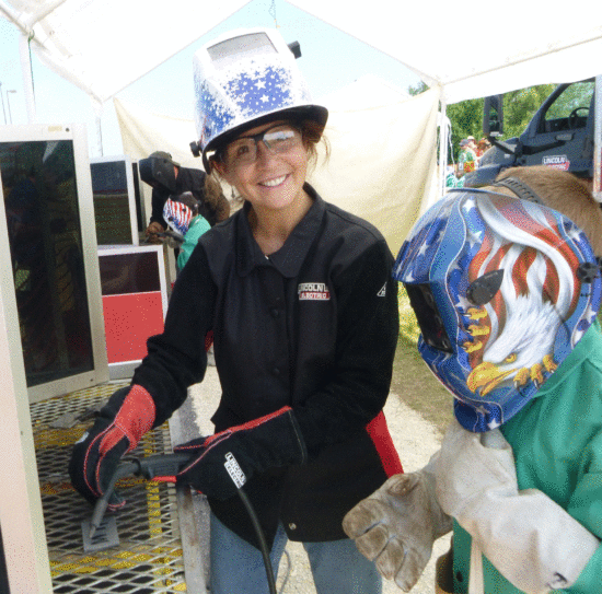 Julie Berkowicz volunteering as a welding merit badge counselor